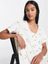 ASOS DESIGN button through mini smock dress in white with yellow floral embroidery