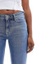 Фото #7 товара & Other Stories low rise flared jeans in mid blue wash