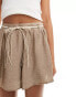 Vero Moda flippy festival shorts with woven tie belt in stone