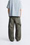 Faded-effect cargo trousers