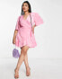 Фото #3 товара Flounce London Plus wrap front mini dress with flutter sleeves in pink satin