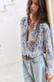 Ruffled floral print blouse