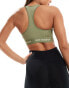 New Balance linear logo medium support sleek sports bra in olive green