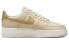 Фото #2 товара Nike Air Force 1 Low "Gold Swoosh" 防滑减震耐磨 低帮 板鞋 女款 米黄色 / Кроссовки Nike Air Force 1 Low "Gold Swoosh" DQ7569-102