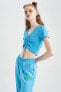 Фото #7 товара Женская блузка defacto Coool Fitted V-образный вырез с каракулем и коротким рукавом X9988az22sm