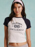 Miss Selfridge California graphic raglan baby tee in cream and navy