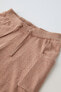 Knit bermuda shorts with pockets