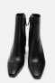 High-heel leather ankle boots with zip
