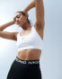 Фото #1 товара Nike Training Swoosh light support sports bra in white