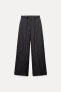 Creased-effect palazzo trousers