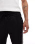 The Couture Club co-ord poly tricot track joggers in black