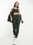 New Balance Linear Heritage high waisted leggings in washed black