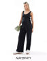 Фото #1 товара Mamalicious Maternity belted jersey jumpsuit with wide leg in black