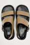 Asymmetric leather sandals