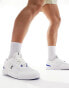 ON The Roger Spin trainers in white and blue