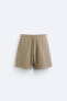 Textured mesh bermuda shorts