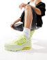 Nike Air Pulse trainers in luminous yellow