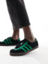 adidas Originals London trainers in black and green