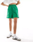 adidas Originals three stripe cargo shorts in green