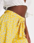 ASOS DESIGN tie belt flippy short in mustard ditsy floral