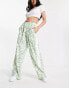 Фото #3 товара ASOS DESIGN pull on trouser with contrast panel in animal print in sage