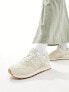 New Balance 574 trainers with gum sole in beige