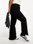 Фото #2 товара In The Style Plus exclusive split hem straight leg jeans in black