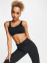 Фото #1 товара Nike Training Alate Coverage Dri-FIT light support sports bra in black