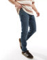 Levi's 502 tapered fit performance cool denim jeans in mid blue Голубой, W34 L32 - фото #1