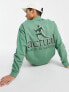 Фото #1 товара ASOS Actual oversized sweatshirt with front and back logo graphic prints in green