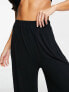 Фото #3 товара ASOS DESIGN Tall jersey palazzo beach trouser in black