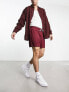 Фото #4 товара ASOS DESIGN oversized shorts in burgundy sporty mesh