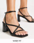 Фото #1 товара River Island Wide Fit tubular strap heeled sandal in black