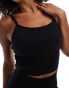 Фото #3 товара ASOS 4505 Icon seamless rib yoga vest with inner bra in black