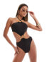 Simmi strappy halterneck cut out swimsuit with gold hardwear detail in black