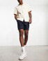 ASOS DESIGN – 2er-Pack mittellange Chino-Shorts mit schmalem Schnitt in Steinbeige und Marineblau