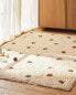 Children's rectangular textured polka dot rug