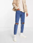 ASOS DESIGN tapered jeans in mid wash blue with knee rips