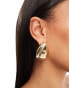 ASOS DESIGN oversized stud earrings with hammered teardrop detail in gold tone