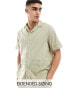 Фото #1 товара ASOS DESIGN relaxed revere shirt in cotton poplin with trim in olive green