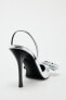 Metallic high-heel shoes with bow