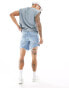 ASOS DESIGN mid length slim denim shorts with heavy ripped hem in light wash blue