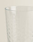 Raised design tumbler