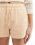 Weekday Essence jersey shorts in beige exclusive to ASOS