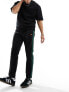 ellesse Luxor straight leg track pants in black