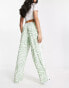 ASOS DESIGN pull on trouser with contrast panel in animal print in sage