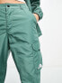 The North Face Alrescha high waist cargo trousers in green Exclusive at ASOS