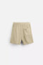 CREASED-EFFECT BERMUDA SHORTS