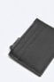 Rubberised card holder with zip