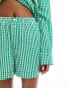 The Couture Club co-ord gingham shorts in green